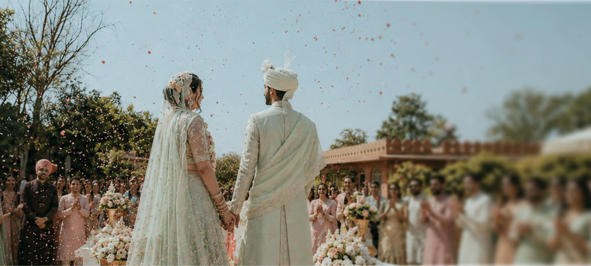A newly married couple celebrating with their families
